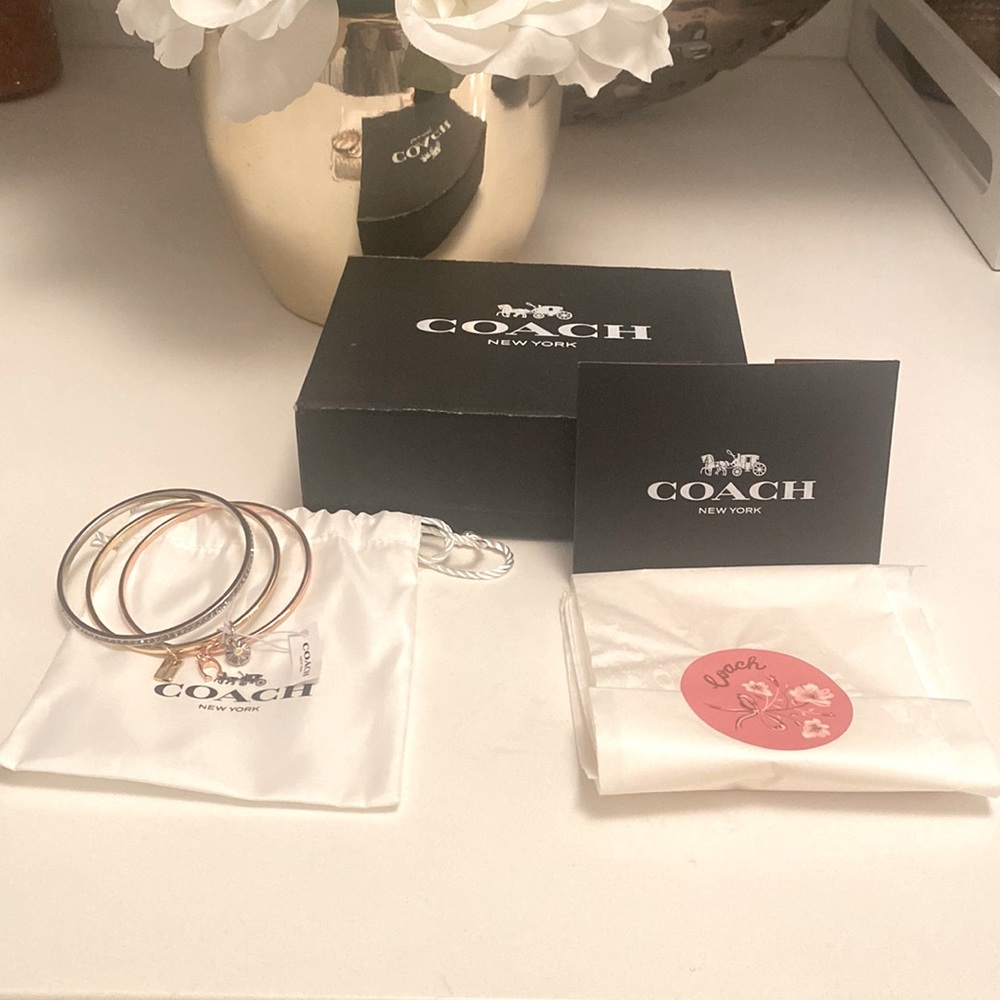 Coach 3 bangle in silver rhinestone, gold and rose gold.
